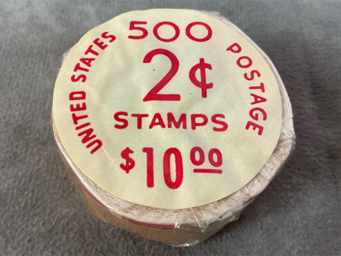 Vintage Roll 2cent Stamps: Mid 1950's Liberty series stamps. Roll of 500 United States 2 cent postal stamps with Thomas Jefferson. Mint, sealed, unused stamps. Measures 2 inches in diameter