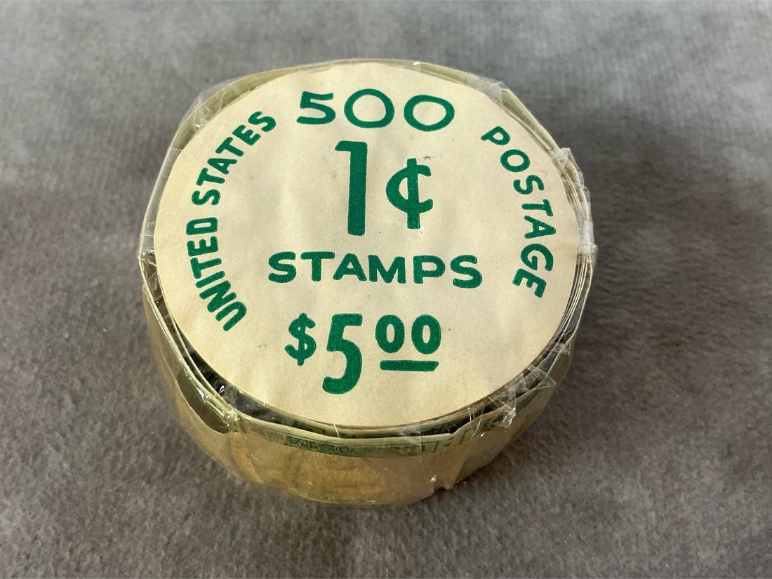 Roll of 1cent Vintage Stamps: 1963 1cent US Postage stamps. Andrew Jackson on 500 count roll of unused stamps. Packaging opened on back so quantity not verified. Measures 2 inches in diameter.