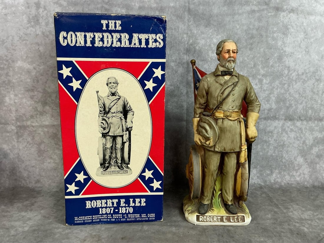Robert E Lee Collectible Decanter: 1970's McCormick Distillery whisky bottles. Robert E Lee figure in "Patriot" series with original box. Box is worn, figure in good condition. Box measures 6.5 inches wide x 5.5 x 13.5 inches tall.