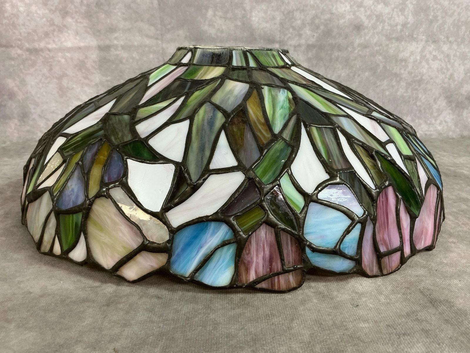 Stained Glass Lamp Shade: Vintage floral and leaves Tiffany style lamp light shade. Handcrafted glass pieces attached with copper foil. In good condition. Measures 14.5 inches in diameter x 5.25 inches tall.