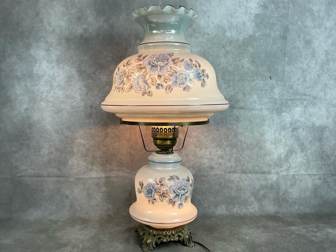 Hurricane Parlor Lamp: Vintage three way electric "Gone with the Wind" style hurricane lamp. Parlor lamp is milk glass painted with blue roses and metal base. Tested and working. Measures 14 inches in diameter at top shade