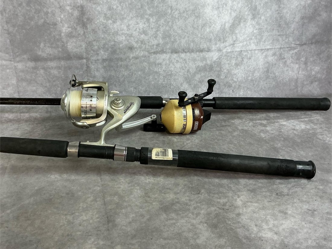 Contender Custom Rod and Reel & Zebco Reel: Two fishing rods for saltwater fishing. Contender by Shakespeare custom open spinning reel and Contender BigWater rod combo. Includes Zebco 808 reel and Zebco Rhino Rod. Some wear, otherwise in good
