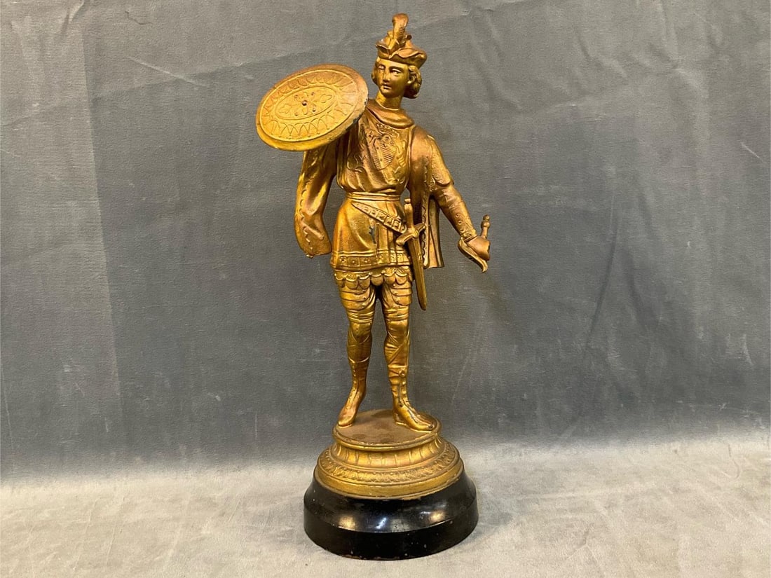 Soldier Clock Topper/Finial: Late 19th century European spelter pot metal clock topper soldier. Missing sword and painted, otherwise good condition. Measures 5 inches wide x 5 x 14.75 inches tall.