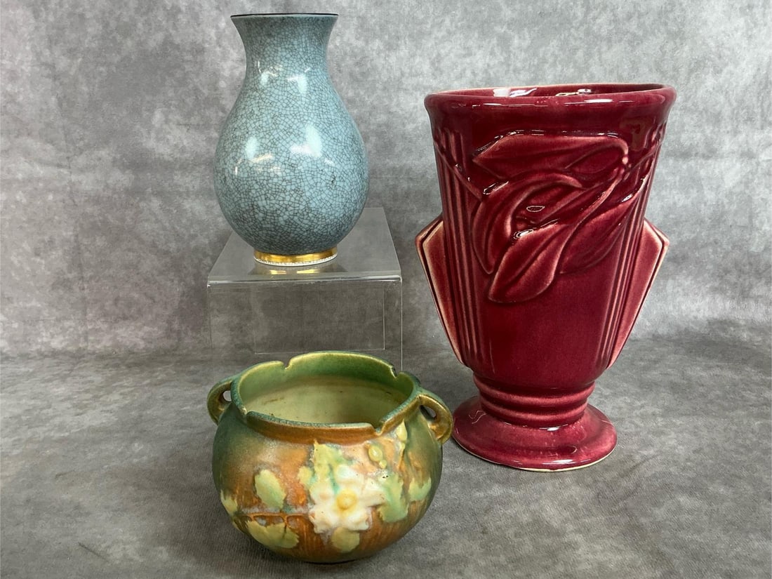 Antique Vases: Three early to mid 1900's decorative vases. Blue and gold crackle glaze Royal Copenhagen- Denmark vase, burgundy fan USA pottery vase, and small Roseville green and brown bowl/ vase. Some age related