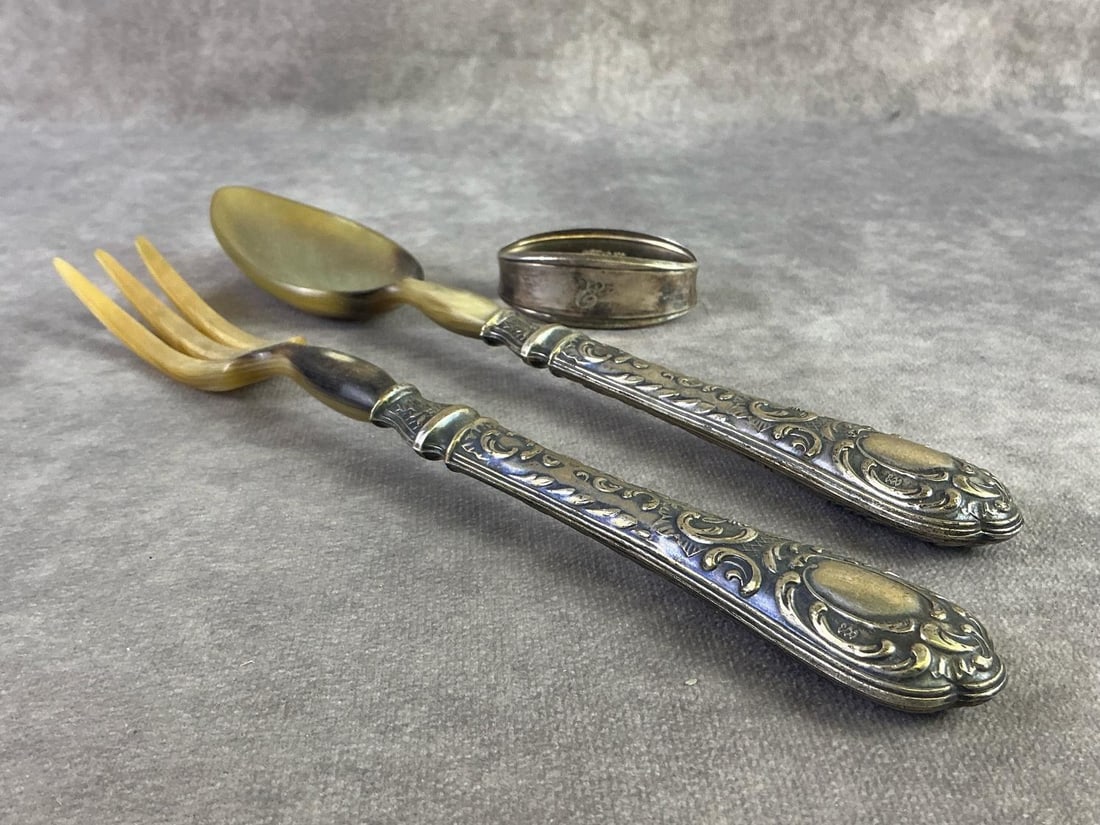 Silver Finds: Two stamped 800 silver serving utensils and stamped 800 silver napkin ring. All in good condition with oxidation present. Total weight 3.8 ozt.