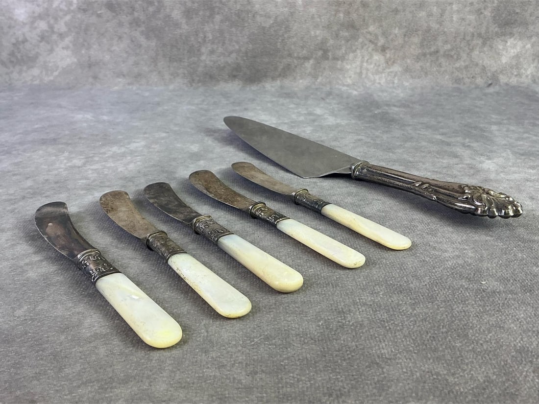 Sterling Finds: Lot of Sterling silver finds including five pearl handle fruit knives and one sterling handled cake server. All in good condition with oxidation present. Total weight 5.33 ozt.