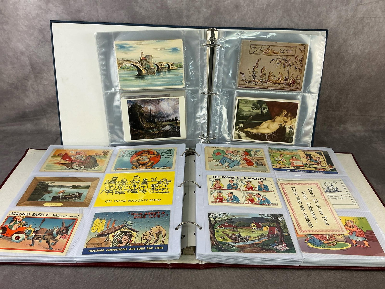 Vintage Postcards: Approximately 500 postcards in two binders. Includes classic works of art, romance, comedy, greeting cards, and more. Condition of cards vary, circulated and non. Largest binder measures 14.75 inches