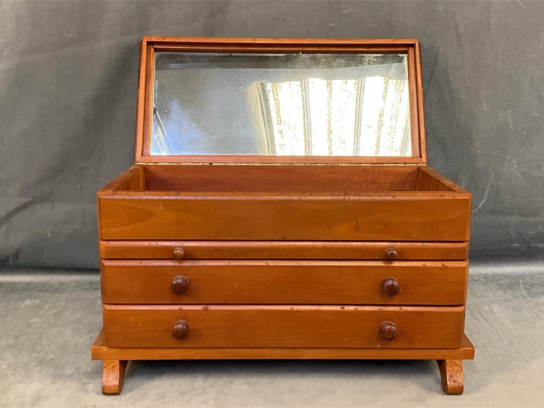 Musical Jewelry Box: Mid-20th century Musical Jewelry Box with three drawers under box with red velvet lining. Good condition. Measures 17.25 inches wide x 8.5 x 10.5 inches tall.