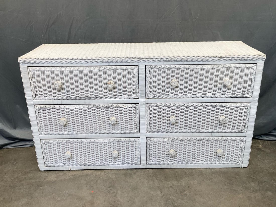 Wicker Chest of Drawers: Late 20th century white painted wicker chest of six drawers. Good condition. Measures 52.75 inches wide x 16.5 x 29 inches tall.