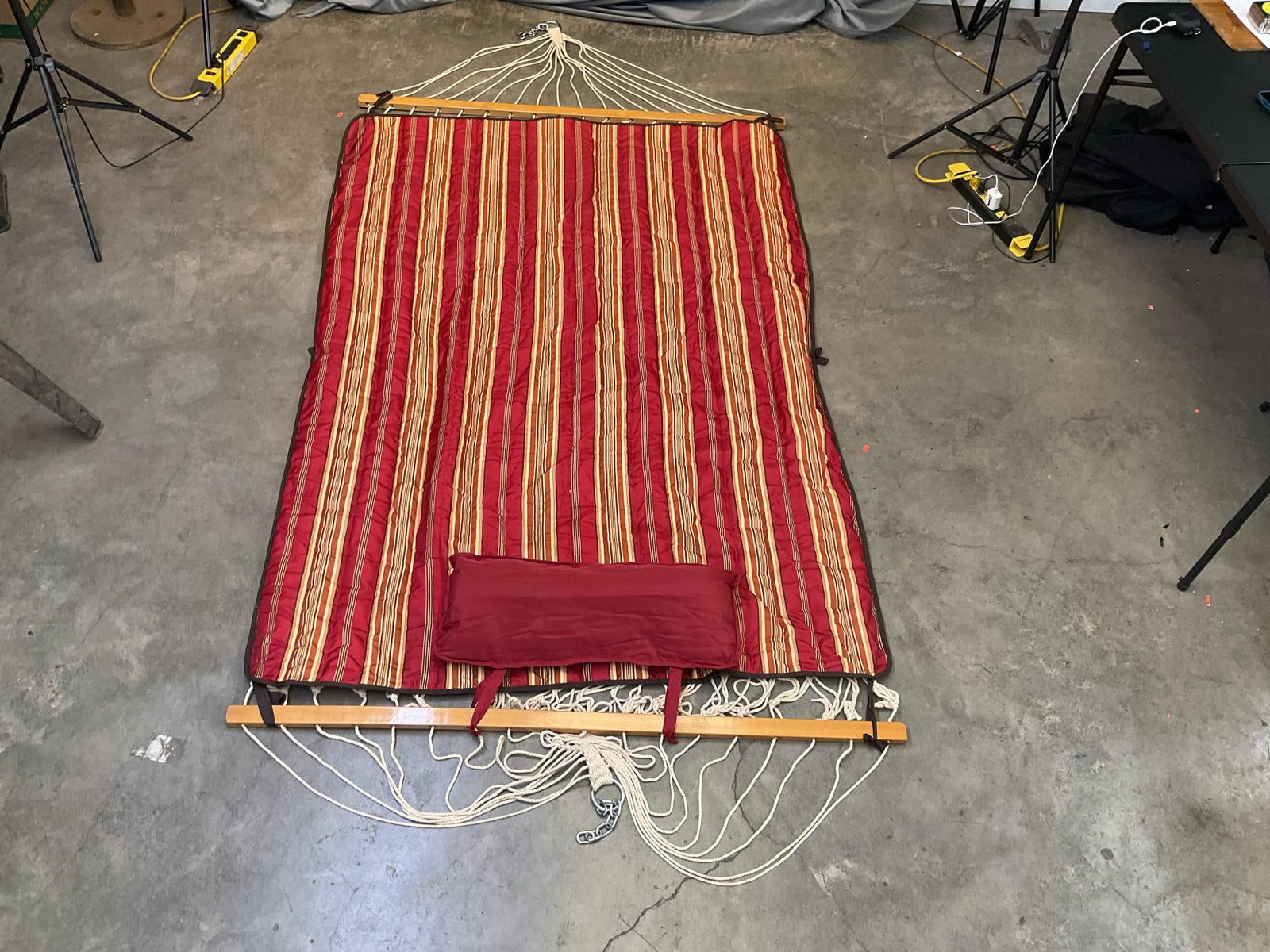 Hammock: Late 20th century hammock with striped fabric cover/blanket. Good condition. Measures 80 inches wide x 51.75 inches between wooden slats.
