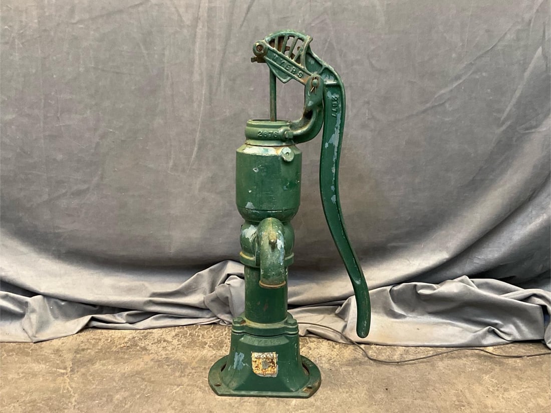 Cast Iron Water Pump: Late 20th century Myers water hand pump. Not tested. Measures 13 inches wide x 14 x 25 inches tall.