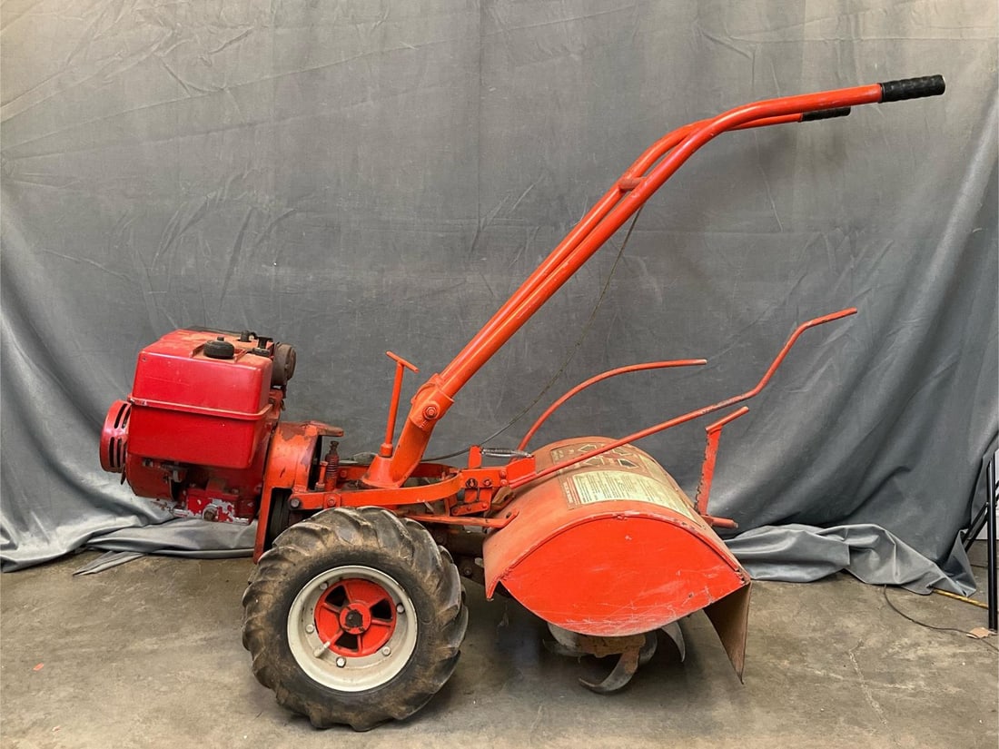 Tiller: 1980's Troy-Bilt Horse Model Roto Tiller 2610 (5/87). Not tested. One flat tire. Measures 59 inches wide x 22.5 x 47 inches tall.