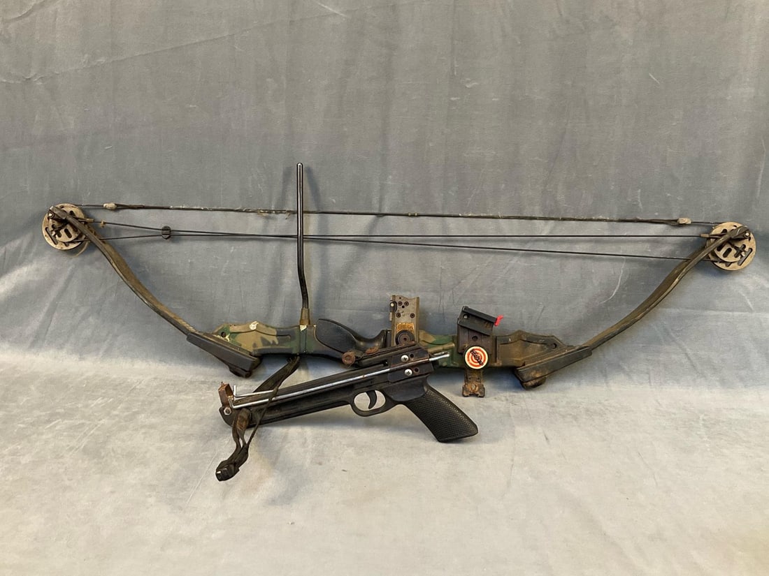 Archery Bows: Late 20th century Precision Series 1000 C compound bow and one Man Kung Recurve Pistol Crossbow. Used condition with surface rust and frayed string. Precision Bow measures 43 inches wide x 13 x 2.5