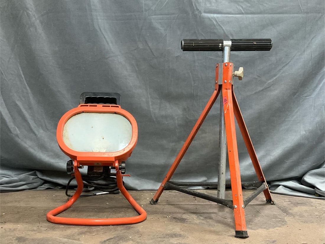 Work Light and Saw Horse: Early 2000's work light and tripod sawhorse. Light tested, works. Work light measures 14 inches wide x 11 x 18 inches tall.