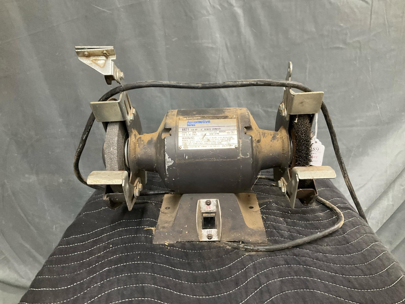 Bench Grinder: 1980's Black & Decker 6821 Automotive Series 6" Bench Grinder. Powers on, not tested. Measures 14.25 inches wide x 9 x 13 inches tall.