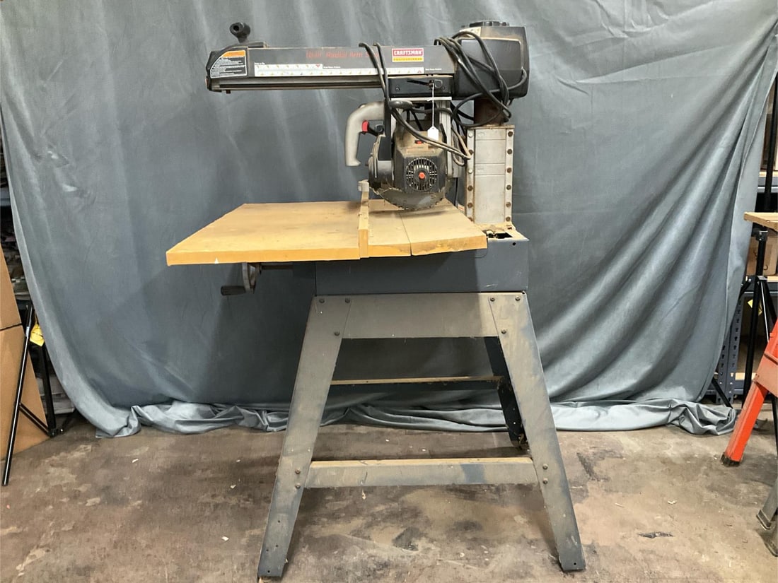 Radial Saw: 1980's Craftsman Professional 10-in. Radial Arm Saw. Does not power on. Measures 40 inches wide x 34.5 x 56 inches tall.