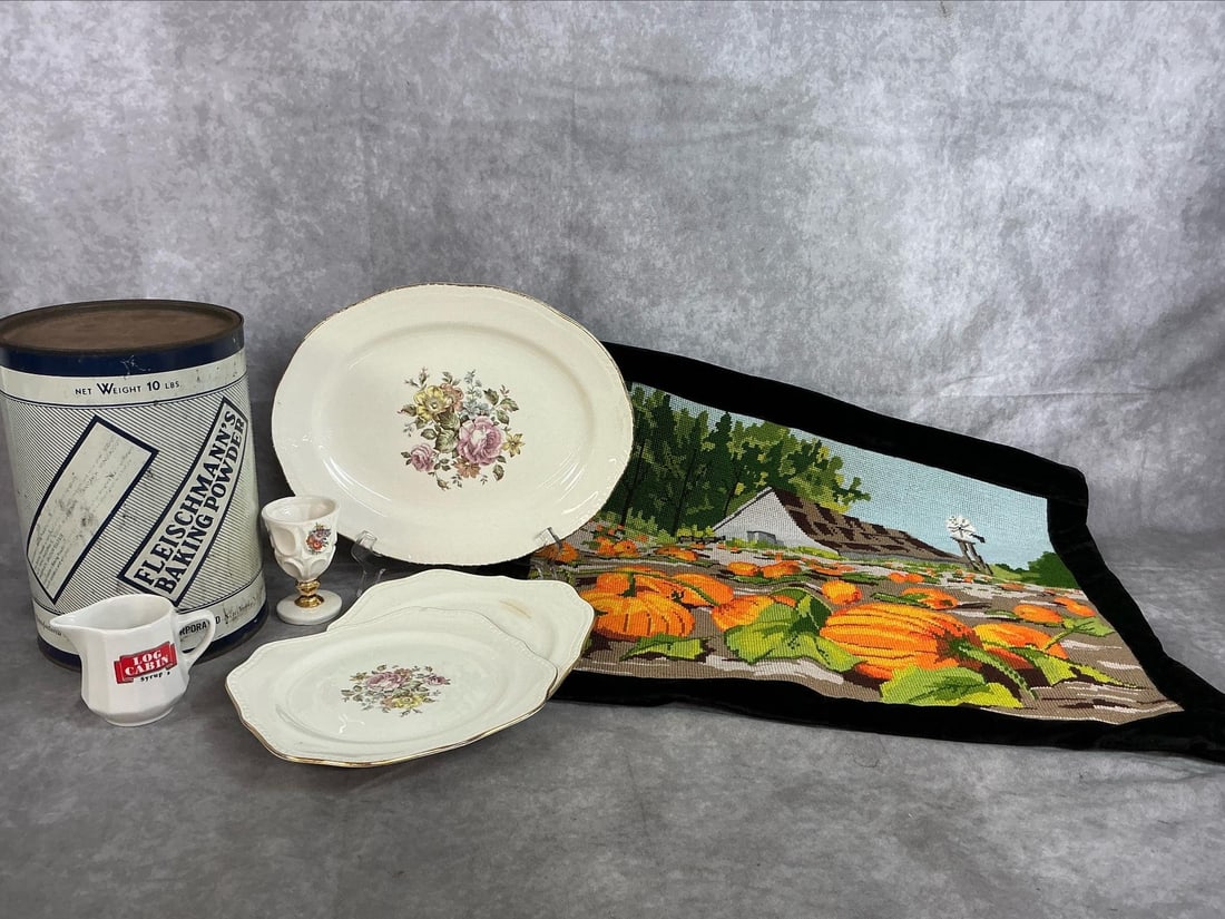 Baking Powder Tin, Syrup Pitcher, Needlepoint and More: Seven mid 1900's collectibles. Fleishman's Baking Powder 10 pound tin, Homer Laughlin eggshell Georgian design platter and plates, and promotional Log Cabin syrup mini pitcher. Includes egg cup, and