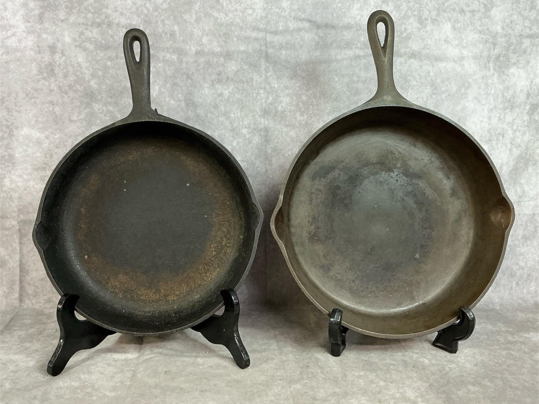Cast Iron Skillets: Two vintage cast iron skillets. Largest is 11 inches in diameter x 2.5 inches tall and marked #9. Slightly smaller skillet is 10.25 inches in diameter x 2.25 inches tall, marked #9 and has rust