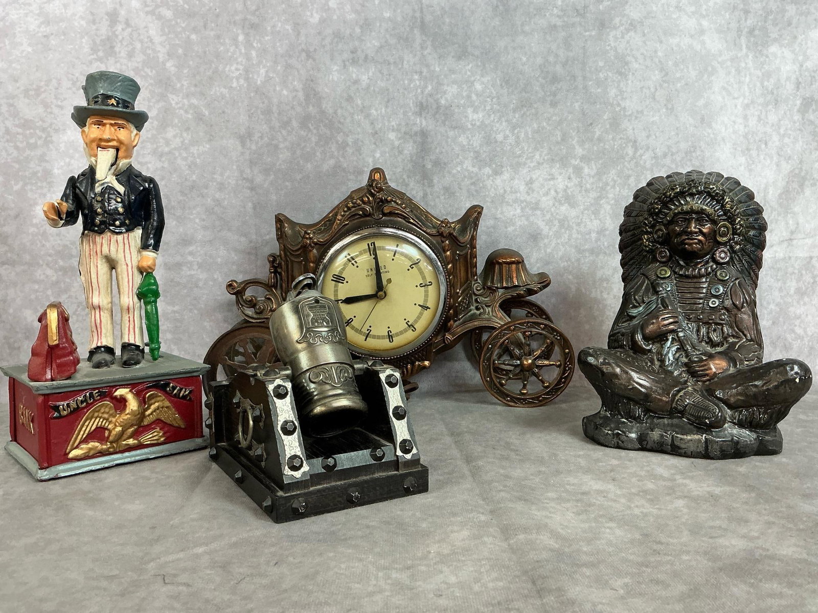 Carriage Clock, Coin Bank, Cigarette Lighter & Sitting Chief (1 of 10)