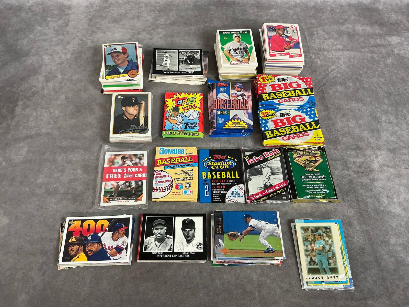 Vintage Baseball Cards: Large collection of 1980's - 1990's baseball cards. Includes Topps, Fleer, Upper Deck and more. Cards are in good condition, some still in wrappers. Most cards measure 2.5 inches wide x 3.5 inches