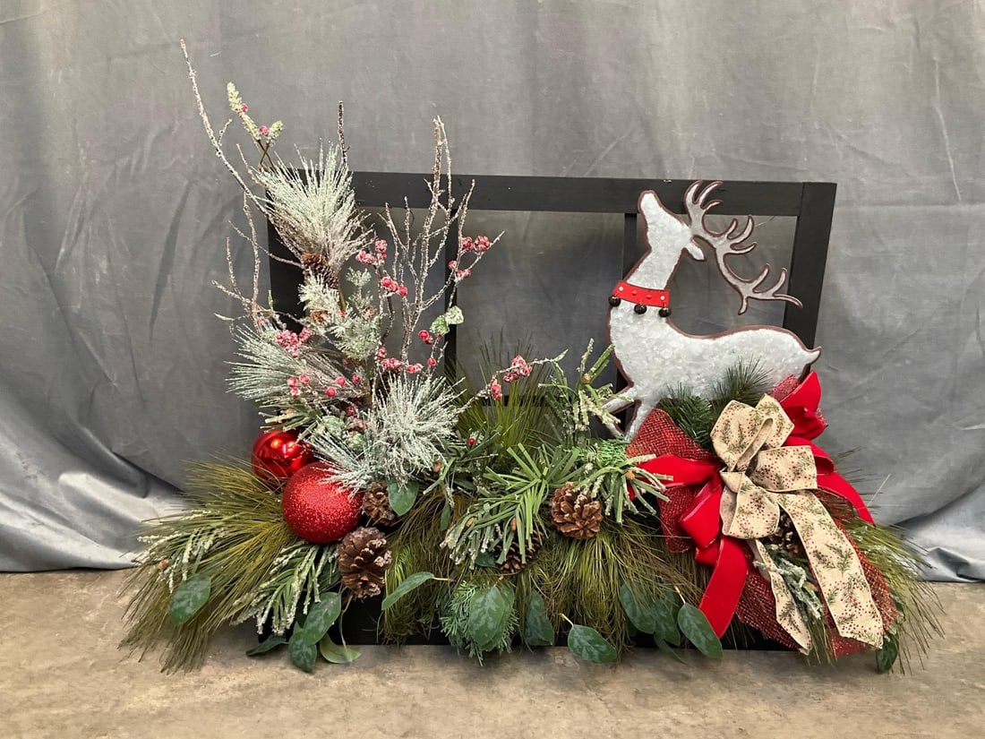 Coniferous Christmas Decoration: 2020's Christmas decoration with coniferous tree branches, pinecones, and reindeer. Used condition. Window measures 34 inches wide x .75 x 28 inches tall.