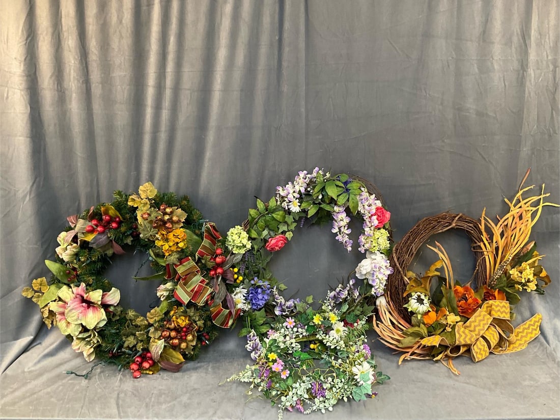 Wreaths: Four late 20th century Christmas (lights work), Spring, and Autumn wreaths. Good condition. Autumn wreath approximately measures 24 inches wide x 4 x 24 inches tall.