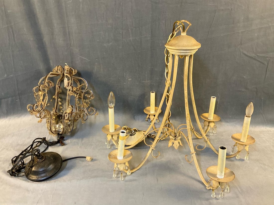 Chandeliers: Two late 20th century chandeliers. One white painted iron six light chandelier. One Venetian style chandelier. Not tested. Large chandelier measures 24 inches wide x 21 inches tall.