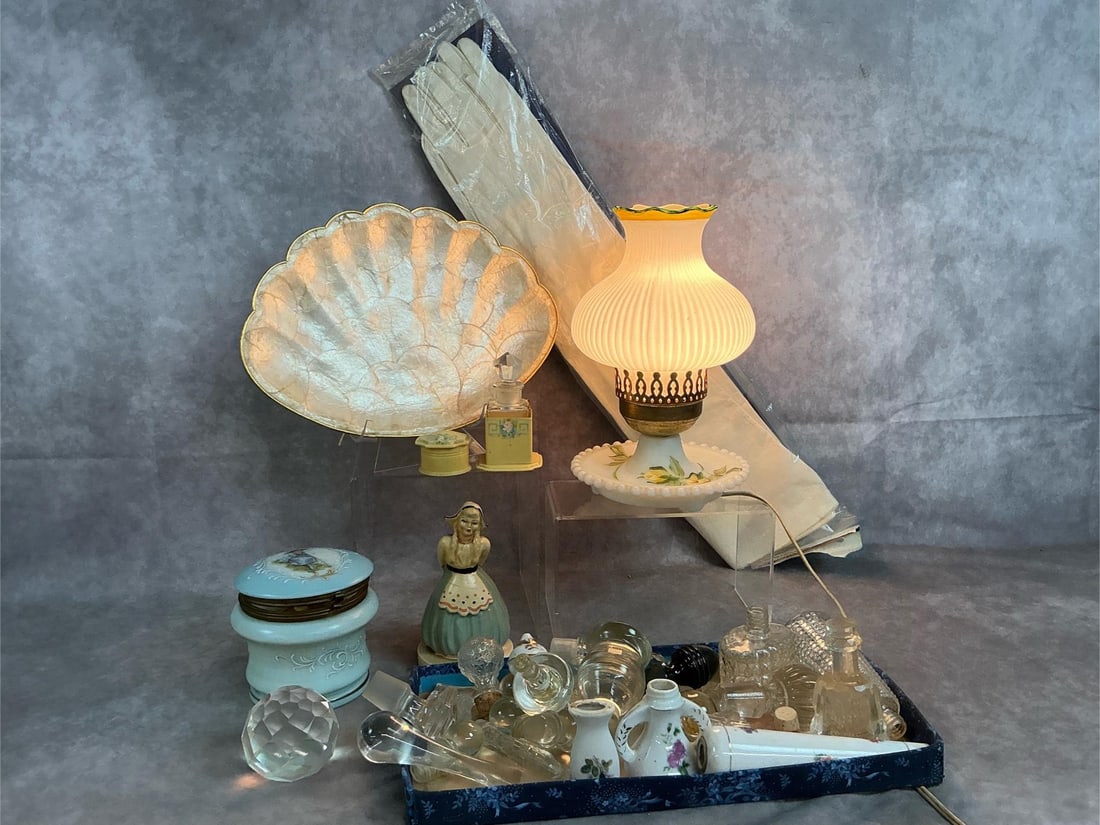 Vintage Ladies Boudoir Finds: Twenty-seven early to mid 1900's items. Milk glass electric lamp with porcelain shade, shell tray with gold edging, dress white long gloves, and blue Victorian powder jar. Includes twenty plus assorte
