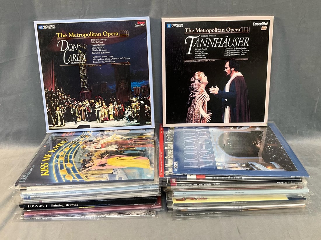 Laser Discs Miscellaneous: Lot of approximately twenty five 1980's - 1990's laser discs featuring; Opera, Musicals, Classical Music, Art, and Classic Movies. Good condition. Measures 12.5 inches wide x 12.5 inches tall.