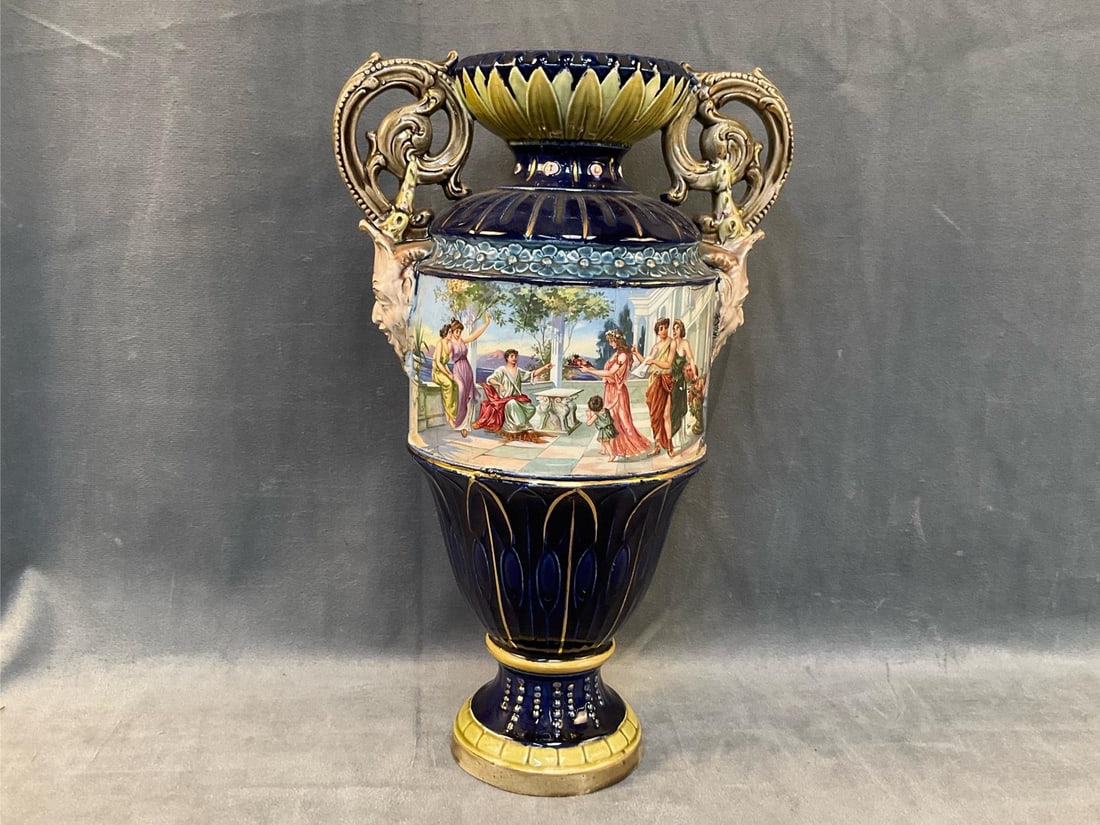 Majolica Vase: Late 19th century - early 20th century hand-painted cobalt and gilt Majolica vase in the Royal Vienna Austrian Neoclassical Style. Each side with a hand-painted finish depicting two different Roman