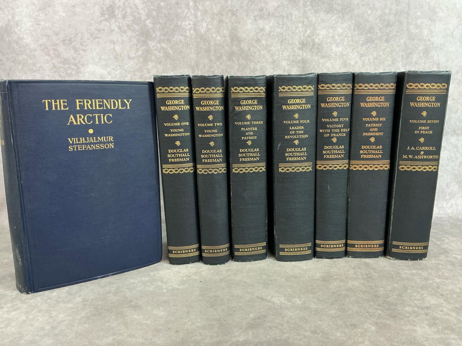 George Washington Book Set & The Friendly Artic: Seven book set from 1948 titled George Washington by Douglas Southall Freeman. The Friendly Artic : the Story of Five Years in Polar Regions by Vilhjalmur Stefansson 1921 copyright. Books have