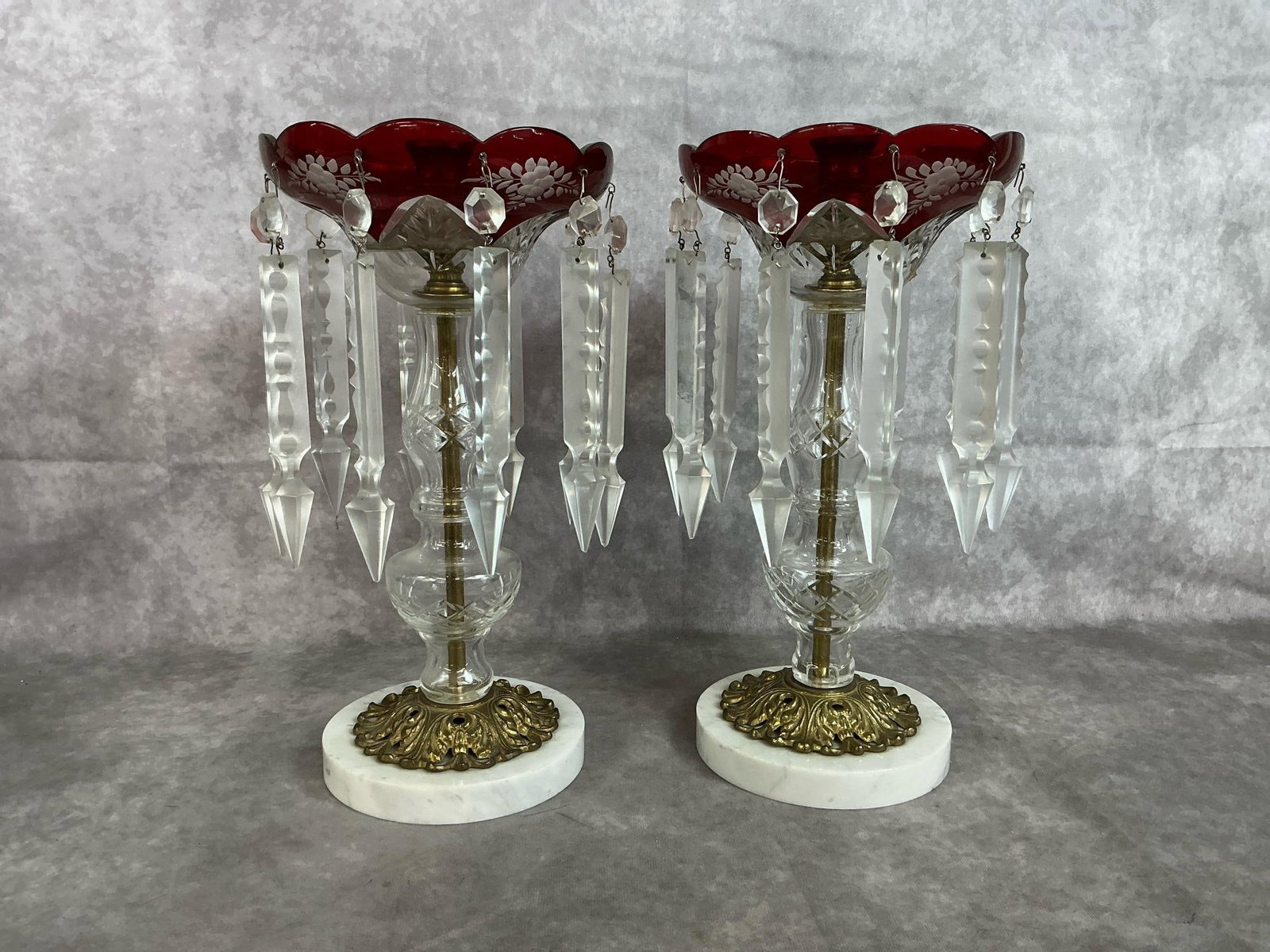 Crystal Candle Holders: Pair of early 1900's "Victorian age reproduction" candle holders. Cranberry glass, metal and marble base, with crystal prisms mantle candle stick holders. In good condition. Each measures 6 inches