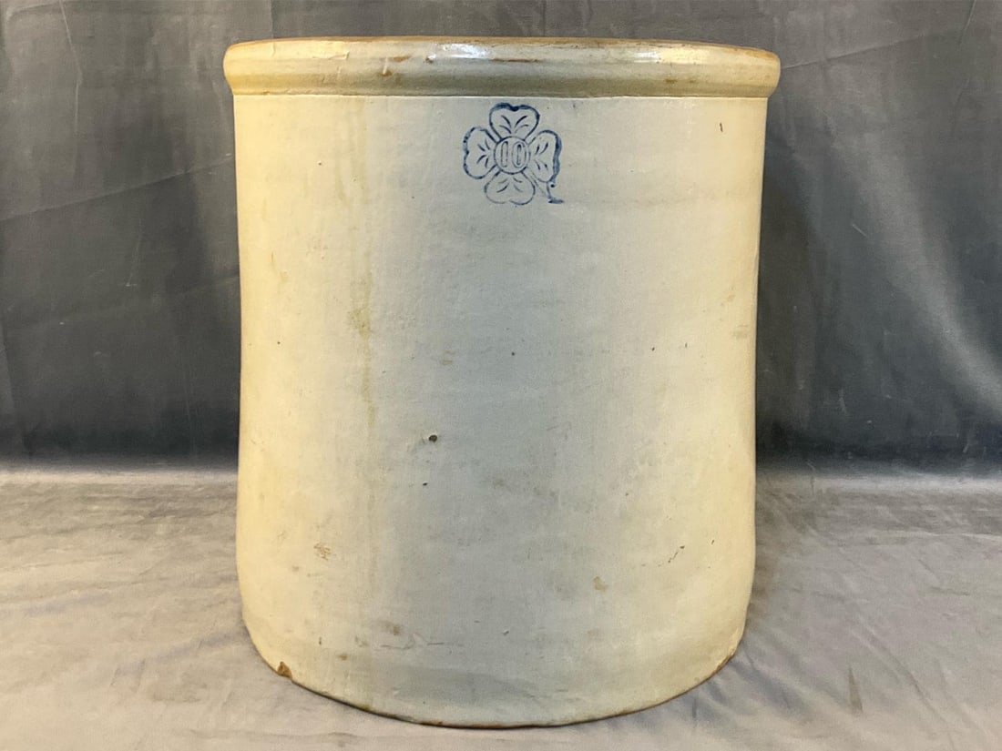 Miller Stoneware Crock: Late 19th - early 20th century Miller (Alabama) ten gallon stoneware crock marked with 10 inside a cobalt four leaf clover. Several small chips to base and rim and small hairline crack. Otherwise