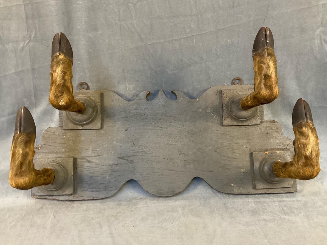 Adirondack Style Gun/Fishing Rod Rack: Late 19th century Appalachian/Adirondack style folk art gun/fishing rod deer hoof wall rack with original paint. Good condition. Measures 28 inches wide x 9.5 x 14.5 inches tall.