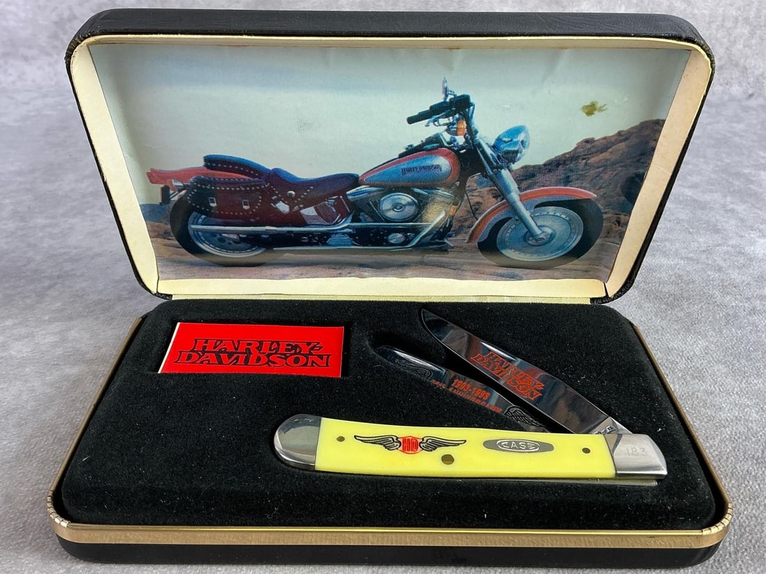 Case XX Knife: 90th Anniversary Harley Davidson Case XX knife. Two blade trapper, patterned 3254 CV, with tight snap and original display case. Box measures 7 inches wide x 4.25 inches tall.