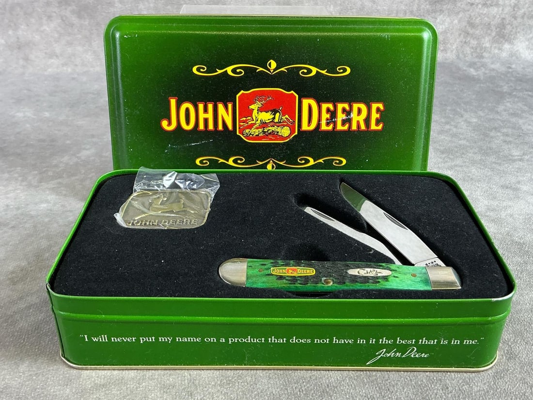 Case XX Knife: John Deere Case XX knife. Two blade trapper, patterned 6254 ss, with tight snap and original display case. Box measures 7.75 inches wide x 4.5 inches tall.