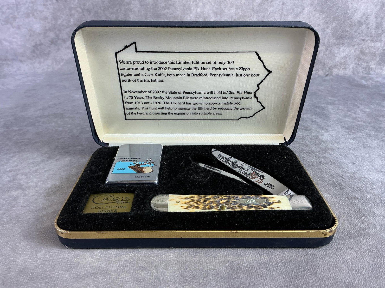Case XX Knife: 2002 Pennsylvania Elk Hunt Case XX knife. Two blade trapper, patterned 6254 ss, with tight snap and original display case. Comes with zippo lighter. Box measures 7inches wide x 4.25 inches tall.