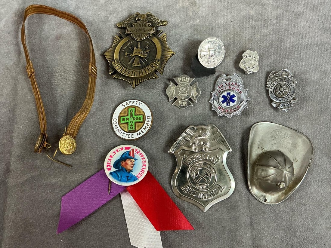 Fire & Rescue Badges: Nine badges and other collectibles from early to late 1900's. Fireman badges from Harley-Davidson, North Sewickley Township, Ladies Auxiliary, and celebration and Junior badges. Includes a Safety and 