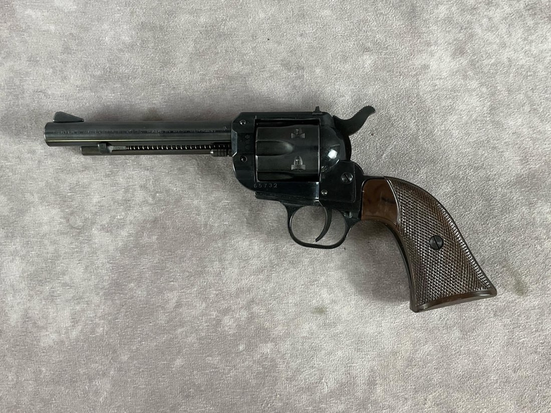 Herters 22 LR Revolver: Serial # 65732 22 lr Single action revolver. Clean bore. One spot of rust on cylinder. Functions correctly and is in good condition, with original box. Barrel length 5 inches, overall length 10