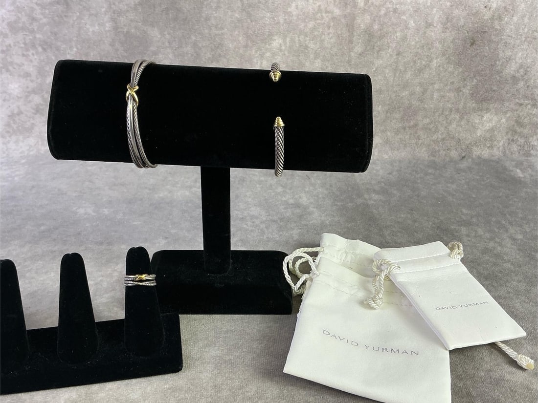 David Yurman: Two David Yurman bracelets and one ring. X classic cable station bracelet in sterling silver and 14kt gold with matching ring and classic cuff featuring sterling silver twisted cable with 14kt gold