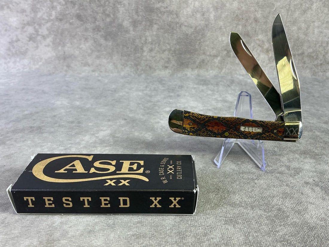 Case XX Knife: Case XX antique bone smooth. Trapper, patterned 6254ss with tight snap and original box. Box measures 4.5 inches wide x 1.75 inches tall.