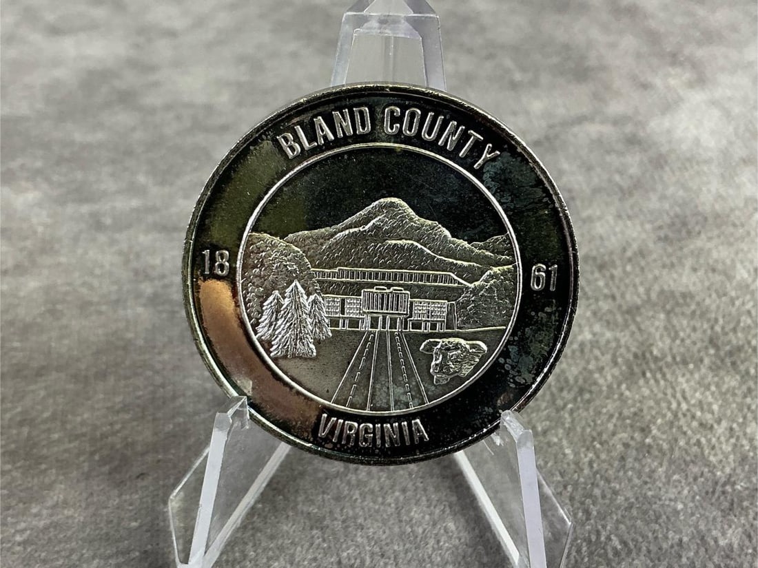 Commemorative Silver Token: Commemorative silver token celebrating the centennial of the Bland County Court House. Stamped with oxidation present. Total weight 1 ozt.