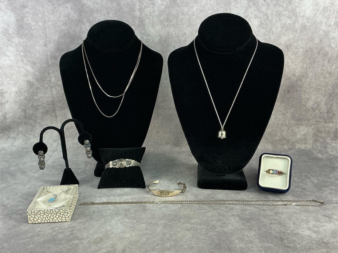 Sterling Silver Jewelry: Lot of Sterling silver jewelry including four necklaces, two pendants, two bracelets, one ring, and pair of earrings. All in good condition and stamped. Total weight 2.11 ozt.