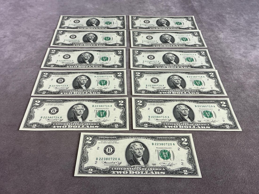 Jefferson Two Dollar Bills: Eleven Thomas Jefferson two dollar bills running in sequential serial numbers. All in good condition and appear to be uncirculated. Each bill measures 6.15 inches wide x 2.65 inches tall.