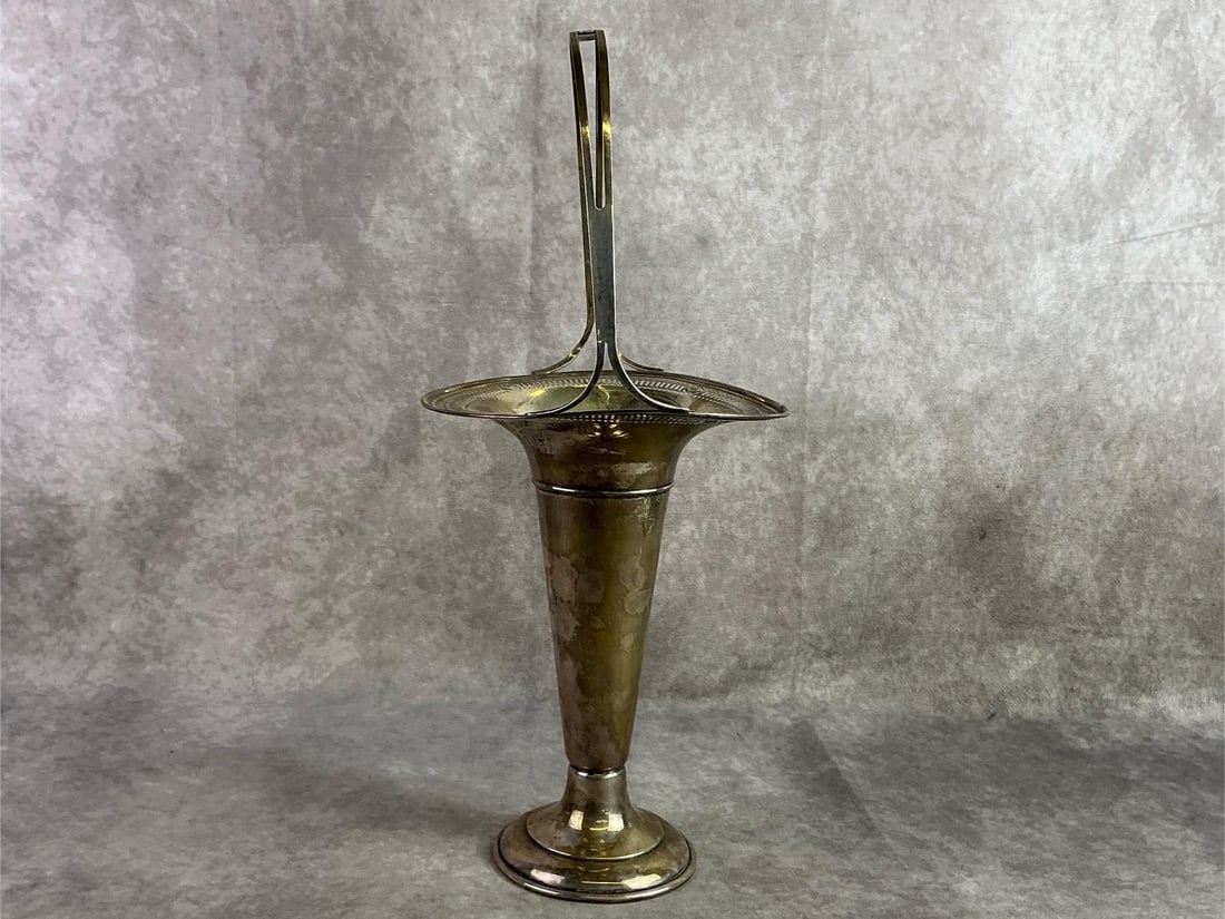 Sterling Silver Handled Basket: J S Company Sterling Silver basket with handle. In good condition with oxidation present and stamped. Total weight 16.35 ozt.