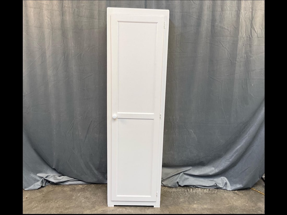 Chimney Cupboard: Mid-twentieth century white painted Chimney Storage Cupboard. Good condition. Measures 18 inches wide x 15 x 65 inches tall.