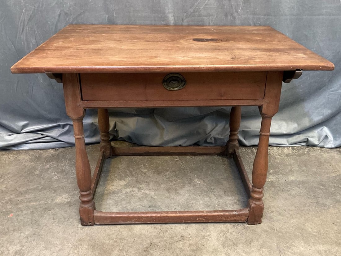Tavern Table: Circa 1795 Virginia/Mid-Atlantic Tavern Table. Primary wood black walnut with tulip poplar and pine secondary. Finish loss to top with partial scrub top. Four turned legs with stretcher base.