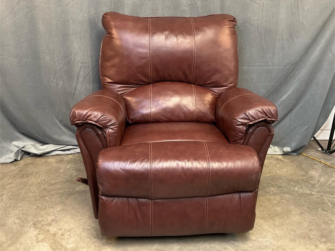 Recliner Armchair: Late twentieth century- modern vinyl Recliner Armchair. Used, otherwise good condition. Measures 40 inches wide x 34 x 40.5 tall.