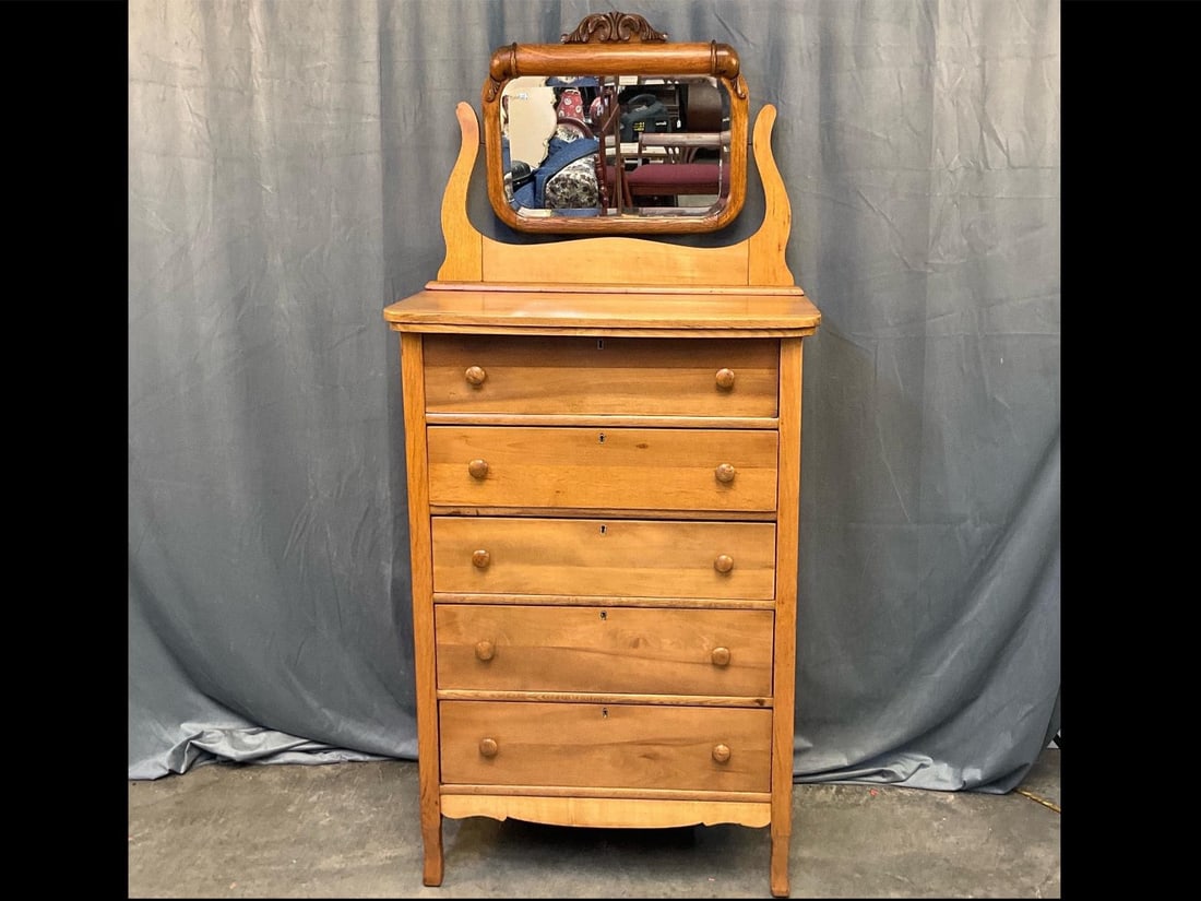 Dresser/Chest of Drawers W/Mirror: Late 19th - early 20th century oak chest of five drawers with carved mirror. Good condition. Measures 33 inches wide x 19 x 71 inches tall.