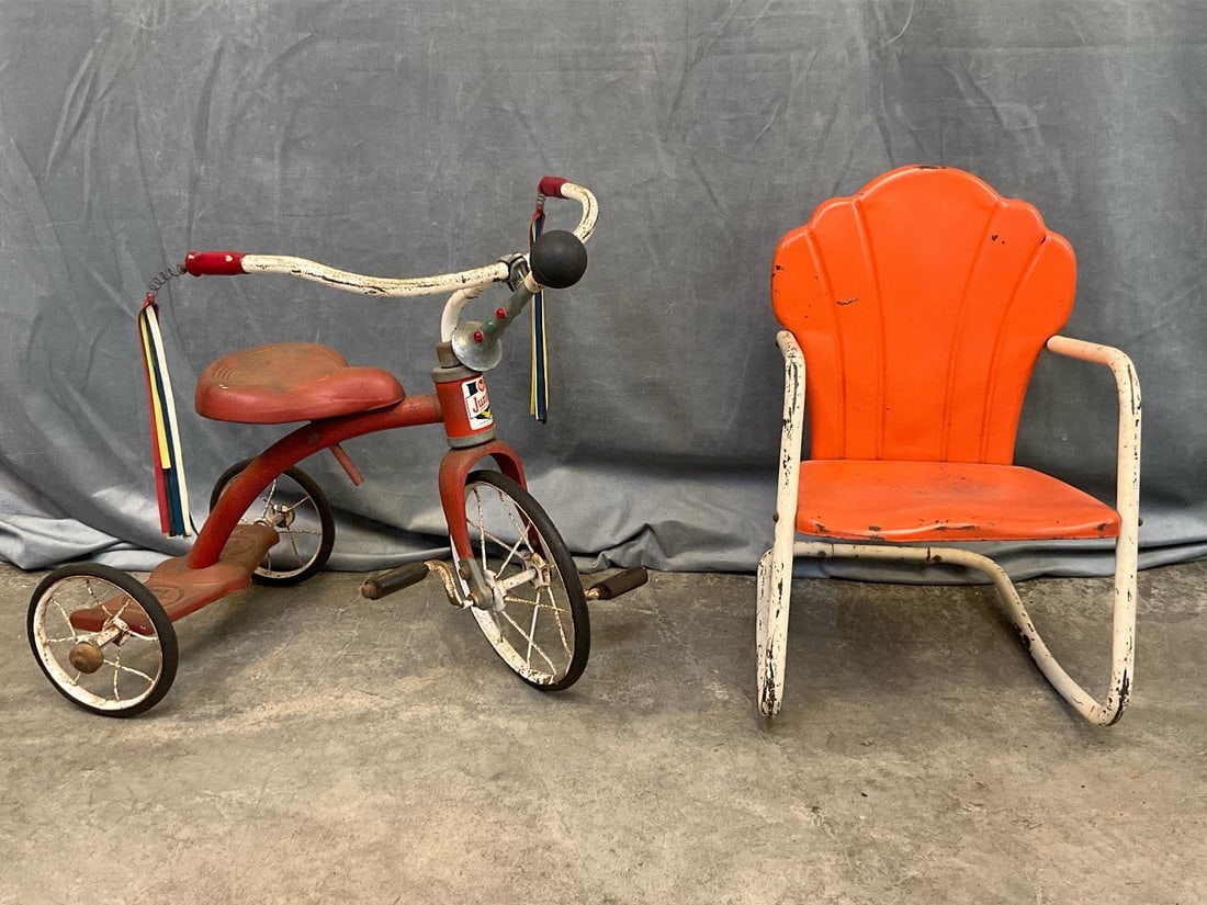 Children's Tricycle & Chair: Mid 20th century Children's AMF Junior Tricycle and Outdoor Metal Rocking Chair. Horn works. Some surface rust, otherwise good condition. Chair measures 13 inches wide x 19 x 21.5 inches tall.